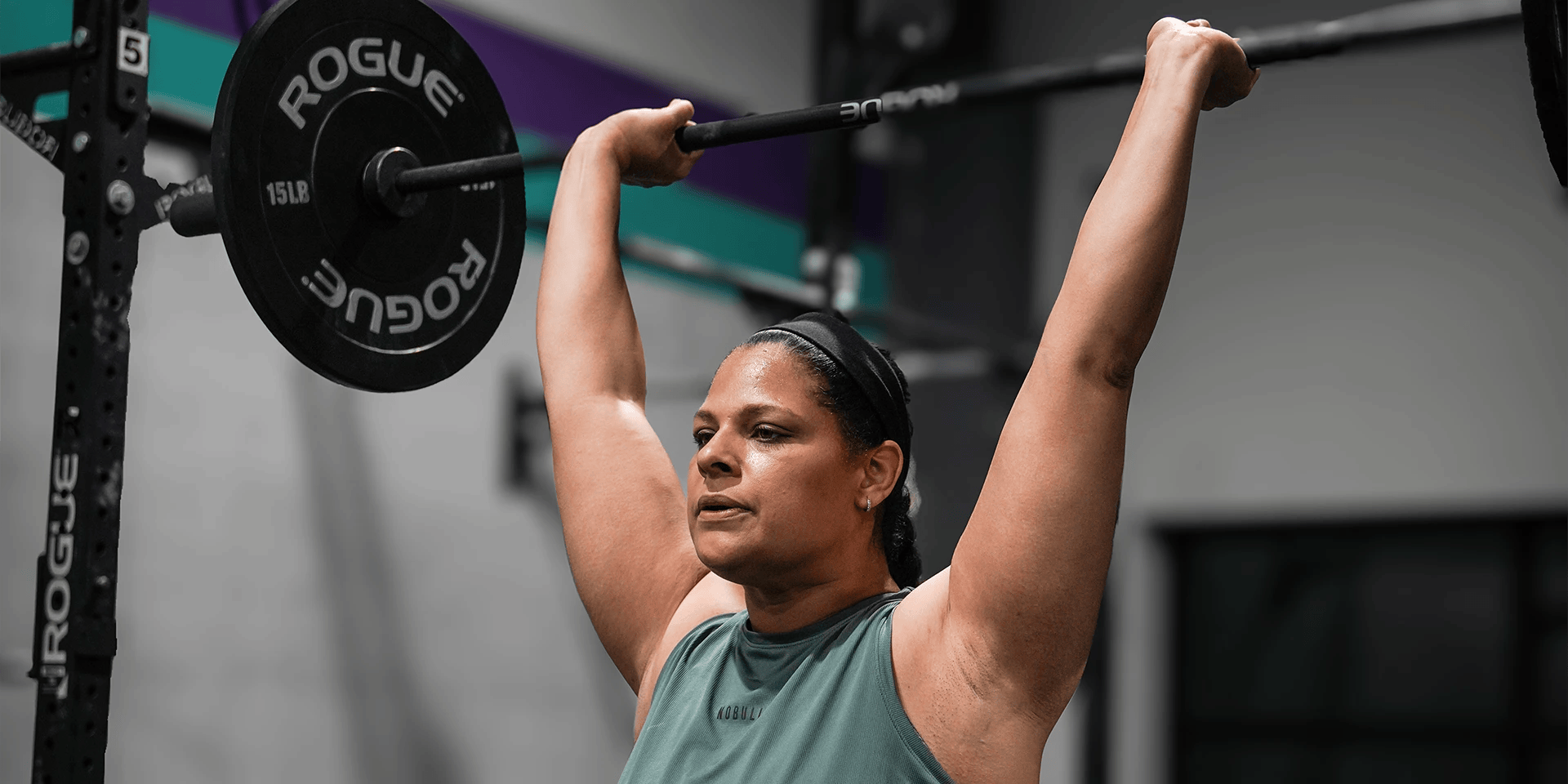 woman lifting weights at CrossFit Kenosha